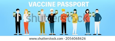 Eight multinational men and women showing the Corona vaccination proof application vaccine passport in their hands.