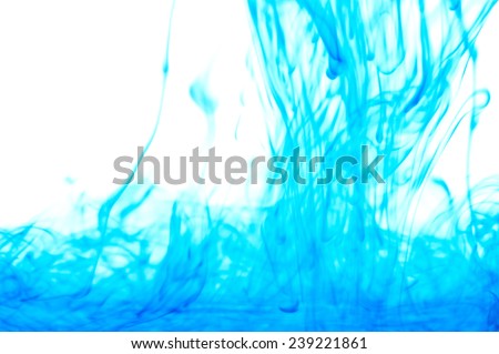 blue ink in water isolated on white