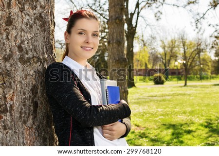 I\'ve made the right choice. You? Student portrait in a park.