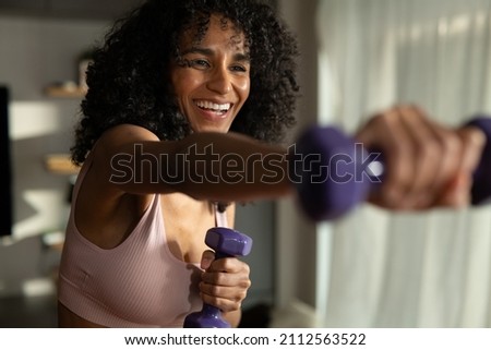 Similar – Foto Bild Frau Training mit Hanteln im Fitnessstudio