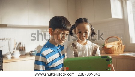 Similar – Image, Stock Photo Brother and sister watching lake