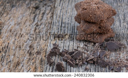 Chocolate Star Shape Cookies with Chocolate Chunks on Wooden Background