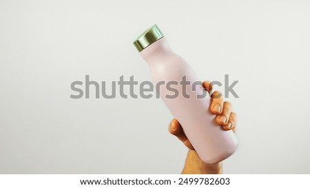 Image, Stock Photo Water bottle on pink background close-up