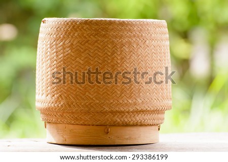 Kratip or sticky rice basket container that is the bamboo container for holding cooked glutinous rice.