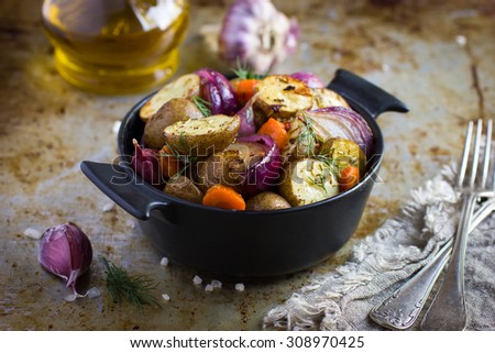 Oven roasted potatoes with  onions, carrot and garlic