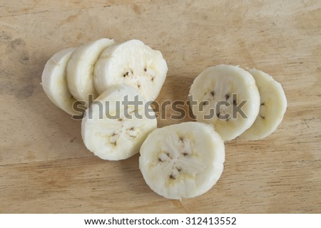 banana slice on wooden background