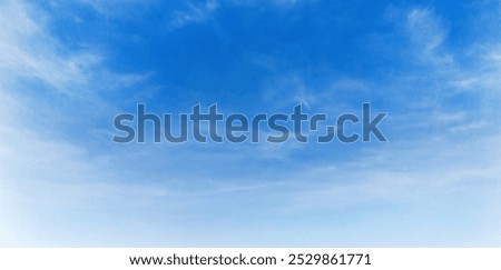 Similar – Image, Stock Photo In the blue summer sky flies a round object , outside with a red edge and inside dark blue. A soap bubble…