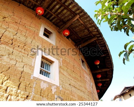 The Earth Tower of Hakka -an ancient Chinese house call Hujian Tulou in China . It was in  list of world heritage by UNESCO. The house built for guarding  against external aggression in ancient.