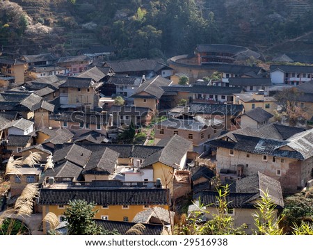 Chinese village in Fujian which is special for the Earth Tower of Hakka -an ancient Chinese building in Hujian, China which was in the list ofthe world heritage by UNESCO.