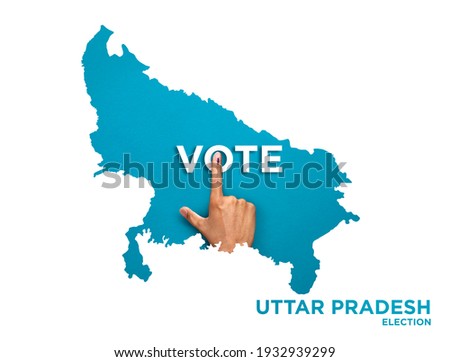 VOTE FOR INDIA UTTAR PRADESH , male Indian Voter Hand with voting sign or ink pointing out , Voting sign on finger tip Indian Voting on blue background