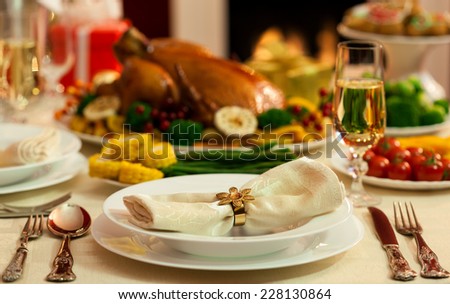 Christmas Place Setting in front of fireplace