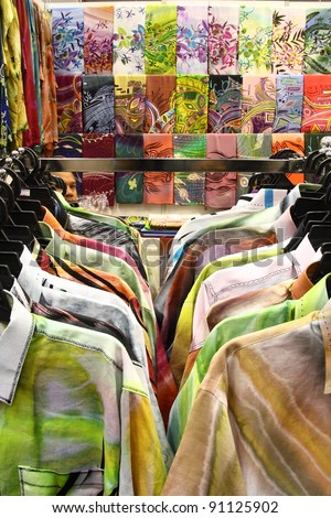 KUALA LUMPUR, MALAYSIA - DEC 10: Assortment of colorful batik textiles and man shirts on display and for sale during the Kuala Lumpur International Batik (KLIB2011) on December 10, 2011 in Kuala Lumpur, Malaysia.
