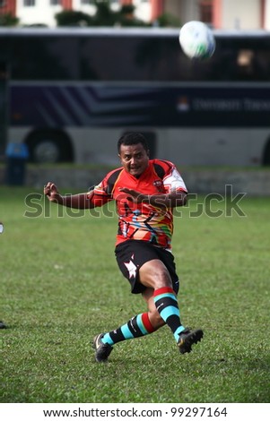 KUALA LUMPUR-MARCH 31: Unidentified Keris Conlay player attempts a conversion during a Malaysian Rugby Union(MRU) Super League match against Bandaraya Dragons on March 31,2012 in Kuala Lumpur,Malaysia.
