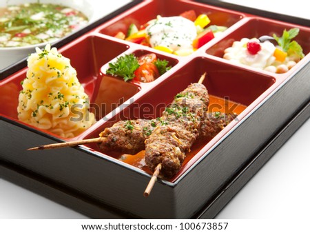 Japanese Meal in a Box (Bento) - Salad, Skewered Meat and Mashed Potato and Dessert