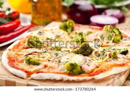 Pizza with Salmon, Broccoli, Cheese and Lemon