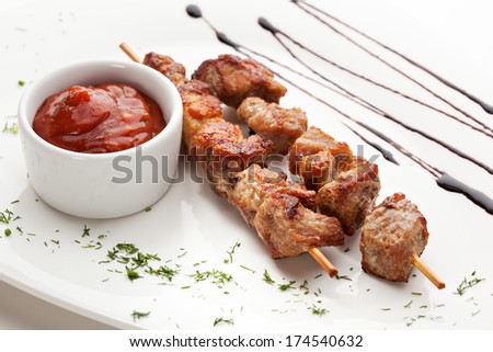 Skewered Meat with Red Sauce