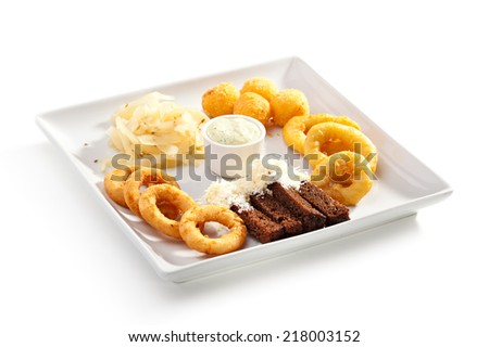Beef Plate - Garlic Toasts with Parmesan Cheese, Cheese Balls and Calamari Rings. Garnished with Tartar Sauce