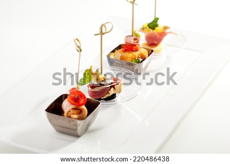 Delicious Buffet Food on White Dish