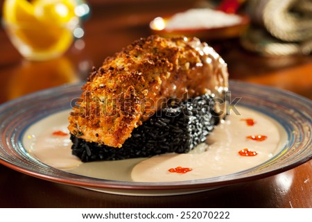 Crisp Salmon Steak with Black Risotto and Cream Sauce