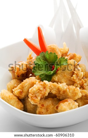 Japanese Cuisine - Tempura Chicken (Deep Fried Chicken) with Parsley. Garnished with Paper