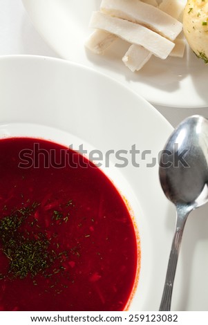 Beetroot and Cabbage Soup with Meat Slice. Garnished with Bread, Lard and Sour Cream