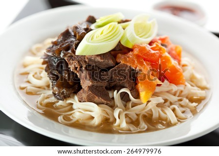 Soup with Chinese Noodles, Tomato, Beef, Onions and Mushrooms
