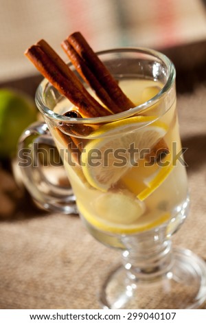 Mulled White Wine Cocktail with Cinnamon Sticks