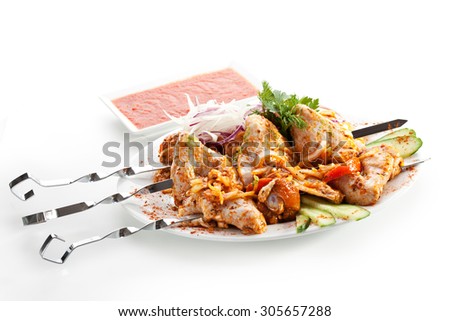 Marinated Chicken with Vegetables and Red Sauce