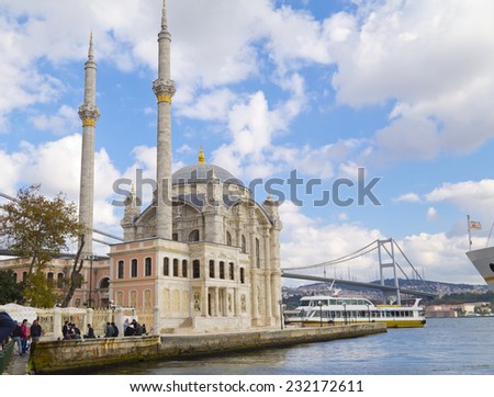 Istanbul, Turkey - October 19, 2014: Ortakoy Mosque and the Bosporus Bridge on October 19, 2014. The two iconic landmarks of Istanbul can be seen from Ortakoy square by the Bosporus.