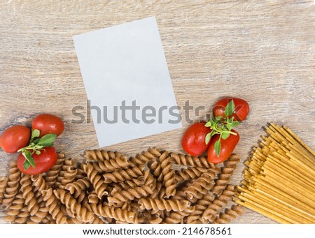 Preparing food on wood background - with note