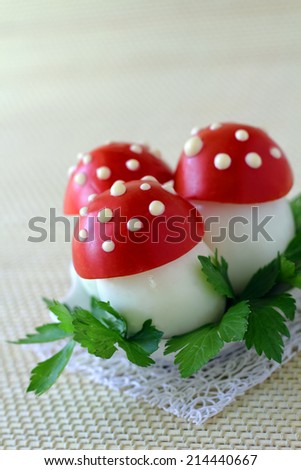 Chicken egg decorated under a fly-agaric