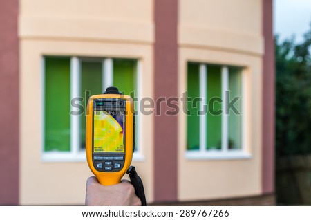 Thermal imaging inspection of house with thermovisor