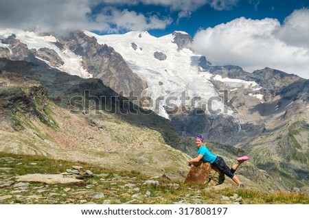 Happy girl at Alpine landscape, Italy, Monte rosa