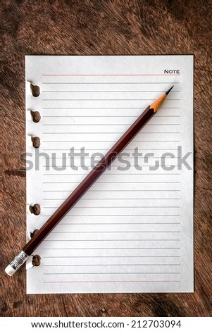 Note pad with pencil