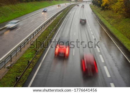 Similar – Image, Stock Photo Passenger perspective rainy weather in the right side mirror