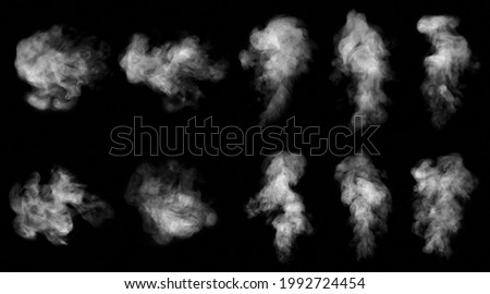Set. Close-up of steam or abstract white smog rising above. water droplets that can be seen that swirl beautifully from humidifier spray. Isolated on a black background