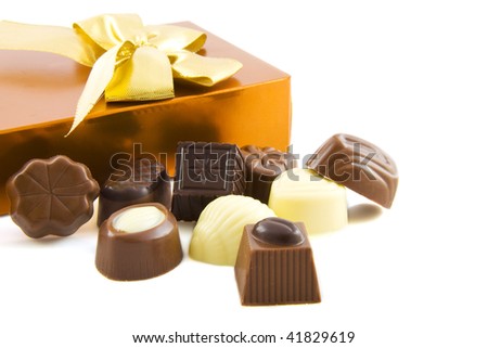 luxury chocolates with a copper gift box on the background