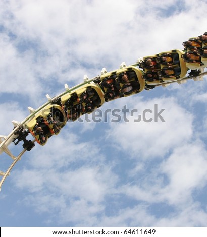 Roller coaster twisting upside down