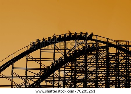 Silhouette of wooden roller coaster