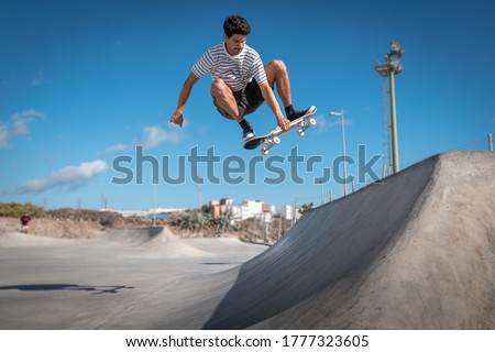 Similar – Image, Stock Photo Man riding skateboard on pump track