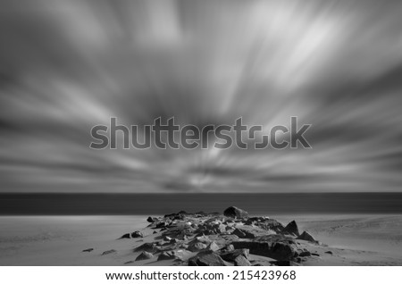 Windy Beach, a photograph of a jetty on the beach during a very windy day.