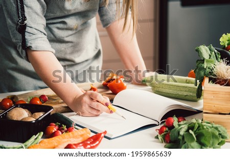 Similar – Image, Stock Photo Woman seasoning food with salt