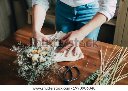 Similar – Image, Stock Photo Arranged bouquet of dried flowers and grasses in natural colours in autumn sunshine in front of a nursery in Oerlinghausen near Bielefeld in the Teutoburg Forest in East Westphalia-Lippe