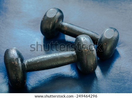Old dumbbells. Weight Training Equipment in physical therapy room
