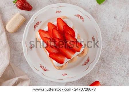 Similar – Image, Stock Photo Strawberries tiramisu on a field of daisies in spring