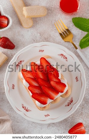 Similar – Image, Stock Photo Strawberries tiramisu on a field of daisies in spring