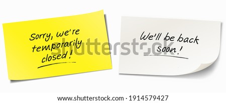Set of two sticky note papers with hand written message - 'Sorry we're are temporarily closed' and 'We'll be back soon'.