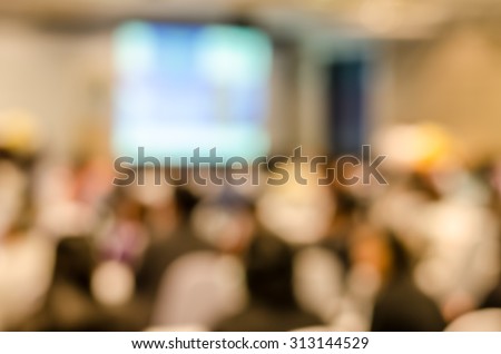 Abstract blurred people in press conference room, business concept, scientific business conference