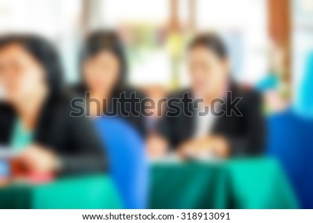 Abstract blurred people lecture in seminar room, education and business concept