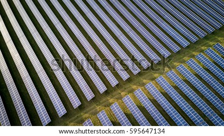 Similar – Foto Bild Solarenergie-Farm. Hochformatige Ansicht von Solarmodulen in einem Energiepark